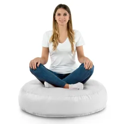 Stylish white round pillow for outdoor use, perfect for terraces