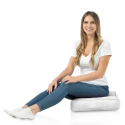 Soft textured white seat cushion for added comfort outdoors
