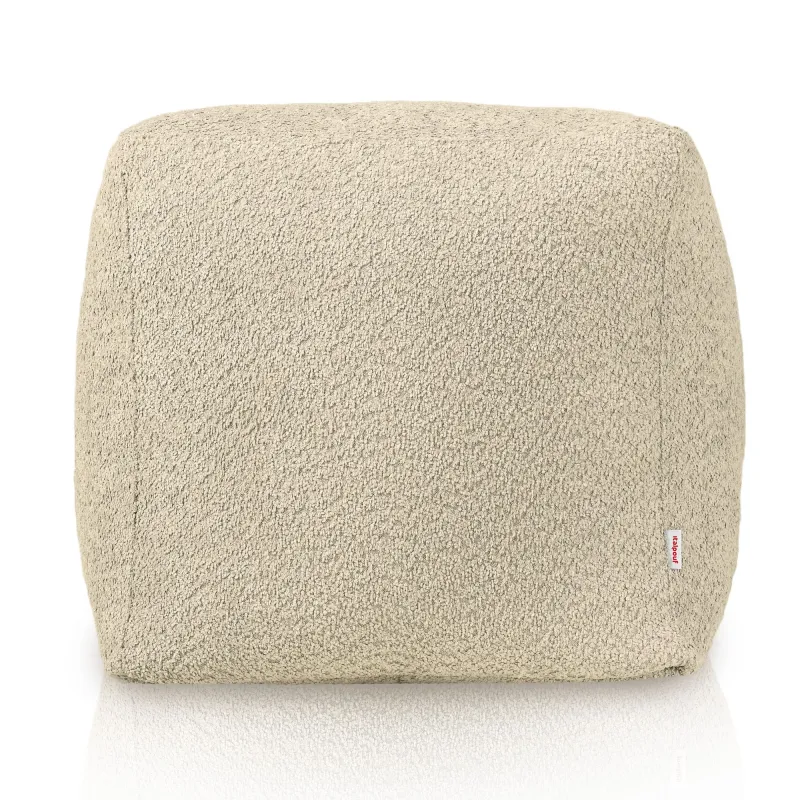 Stylish beige pouf in square shape for versatile decor