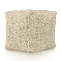 Soft beige pouf with boucle texture for cozy living areas