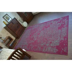 Vintage rug with a classic pattern, great for the bedroom or office