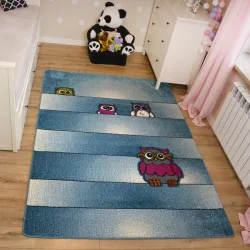 Blue children's rug with owl design, a stylish addition to any room