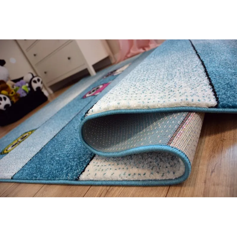 Colorful children's rug with owls, great for a toddler's room
