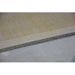 Garden rug in grey and cream with turquoise accents
