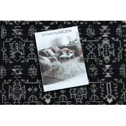 Stylish black vintage rug 22212996 for the living room