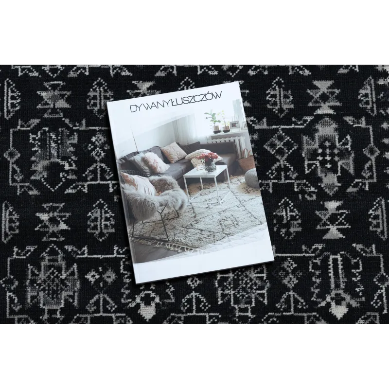 Stylish black vintage rug 22212996 for the living room
