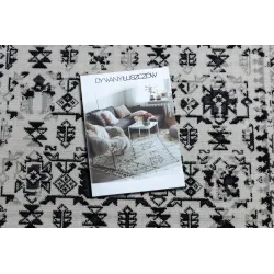 Classic vintage rug in beige, stylish addition to home decor