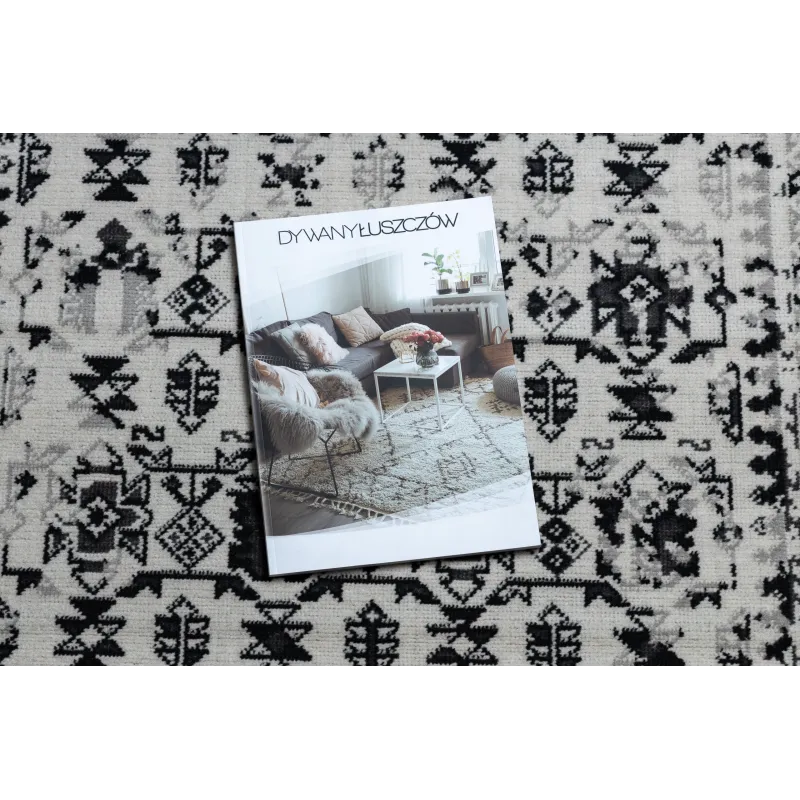 Classic vintage rug in beige, stylish addition to home decor