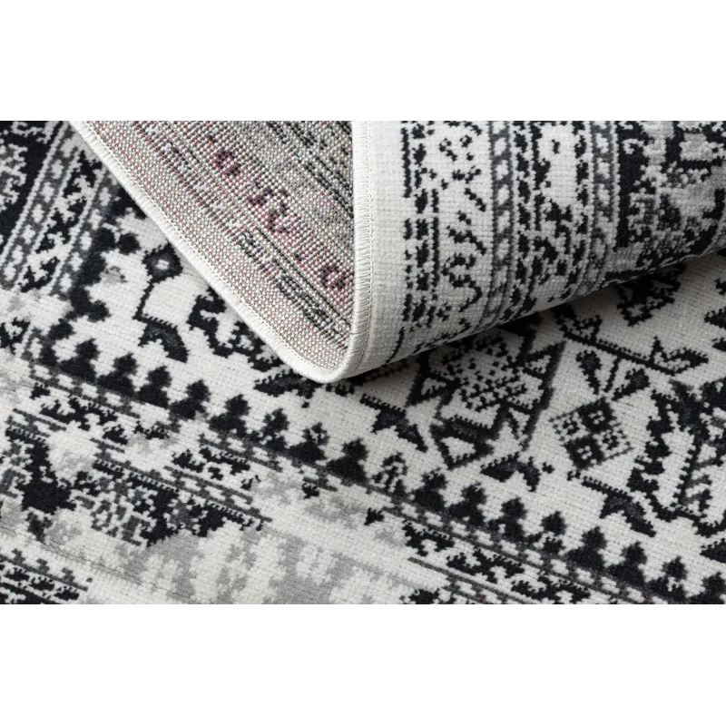 Beige vintage rug, soft and pleasant to the touch, perfect for bedrooms