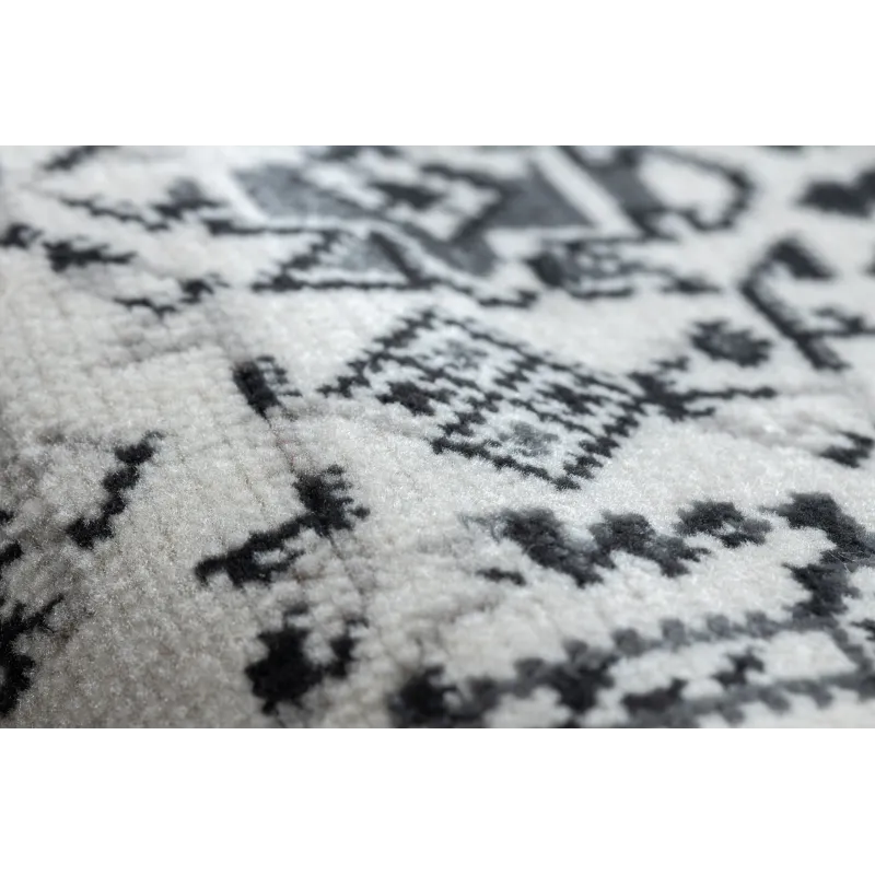 Stylish vintage rug in beige, perfect for children's rooms