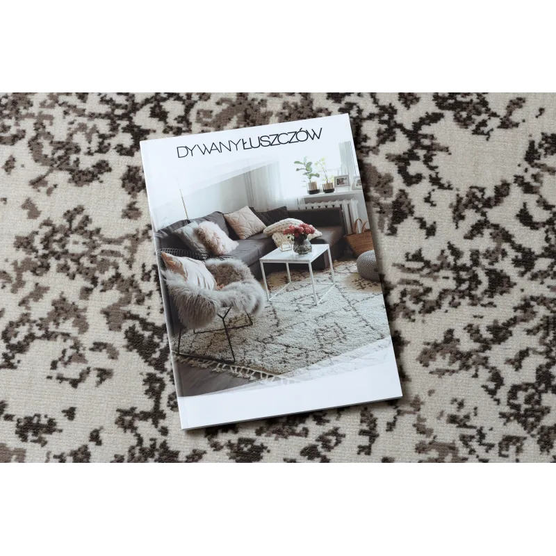 Stylish beige vintage rug, ideal for classic interior designs