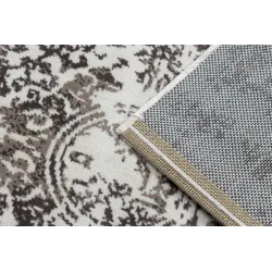 Soft beige vintage rug, perfect for bedrooms