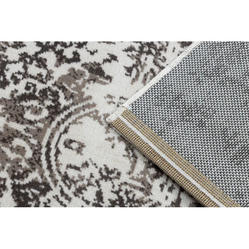 Soft beige vintage rug, perfect for bedrooms