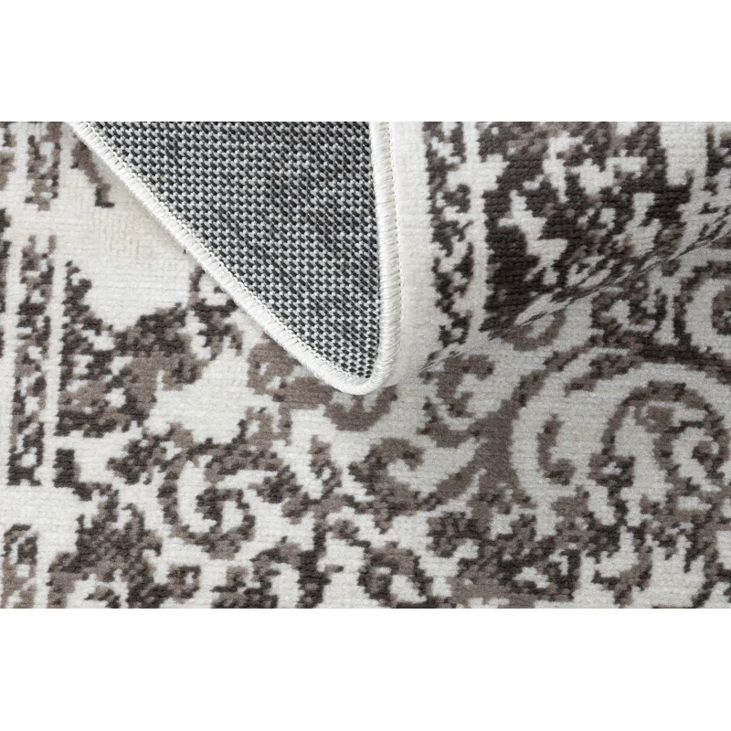 Beige vintage rug, perfect for outdoor or patio use