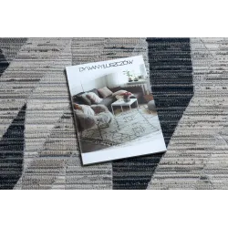 Modern REBEC rug in navy and cream, stylish design, perfect for living areas