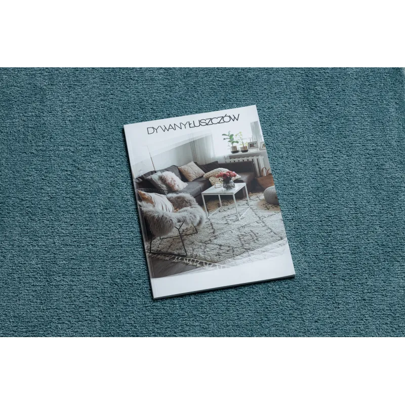 Washable rug in turquoise, combining modern design with practicality