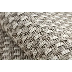 Beige sisal rug in boho style, ideal for bedrooms or kids' rooms