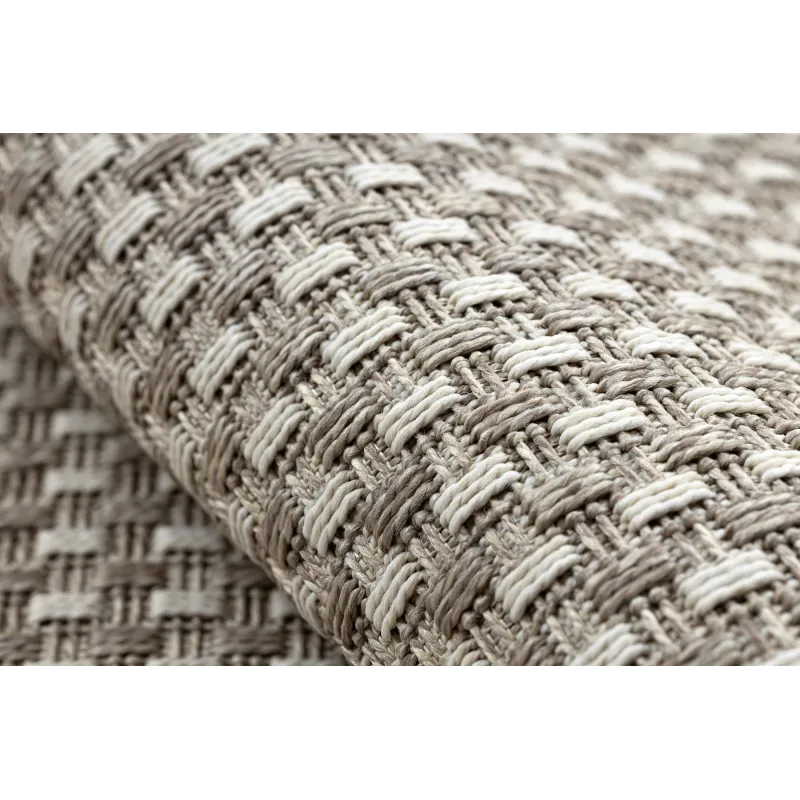 Beige sisal rug in boho style, ideal for bedrooms or kids' rooms