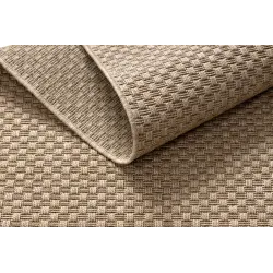 Outdoor beige sisal rug in boho style, perfect for patio