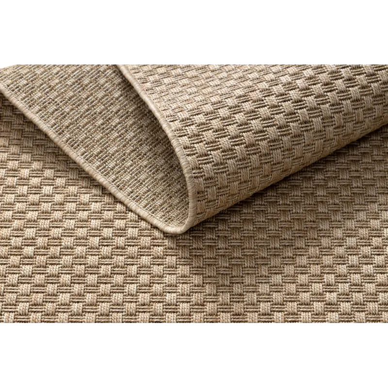 Outdoor beige sisal rug in boho style, perfect for patio
