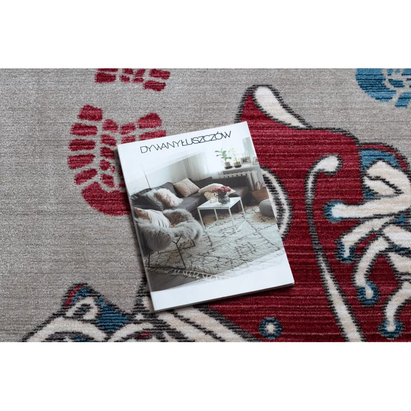Modern children's rug in grey and red, perfect for a child's room