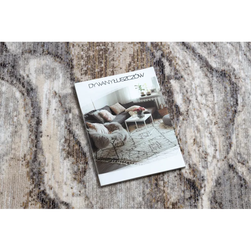 Modern TINE 75313B rug with irregular shape in shades of grey