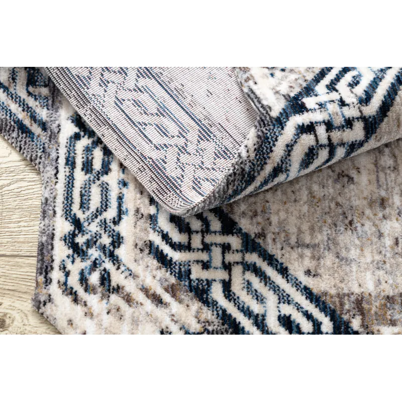 Living room vintage rug in grey and navy, perfect for interiors