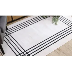 Modern cream rug featuring an elegant design