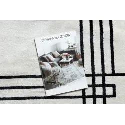 Elegant rug with a modern pattern in cream tones
