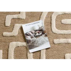 Elegant beige rug, made of sisal, suitable for modern interiors