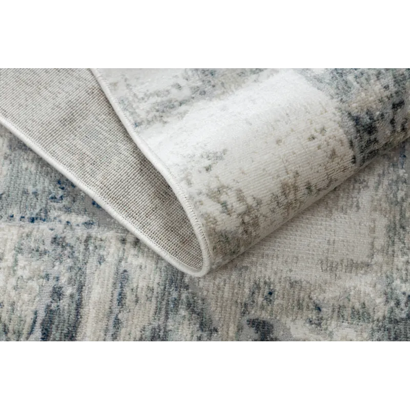 Geometric patterned rug, perfect for modern interior spaces