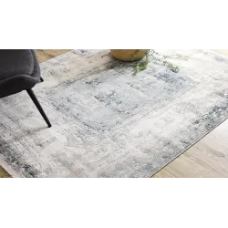 Modern rug in shades of blue - stylish addition to any room