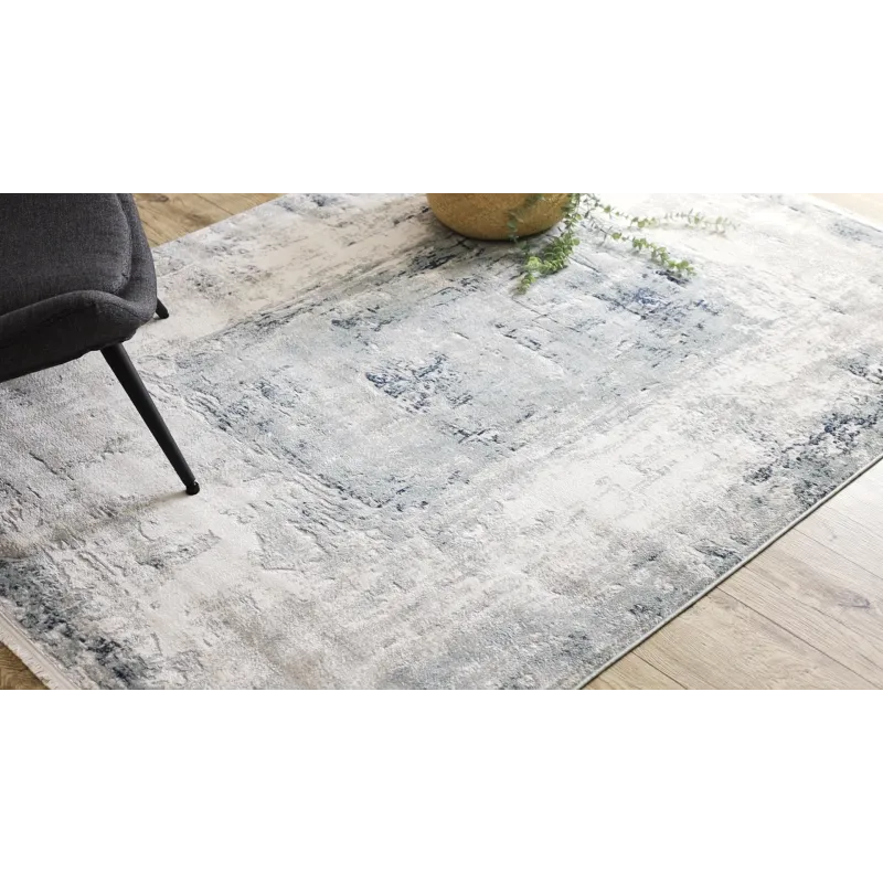 Modern rug in shades of blue - stylish addition to any room