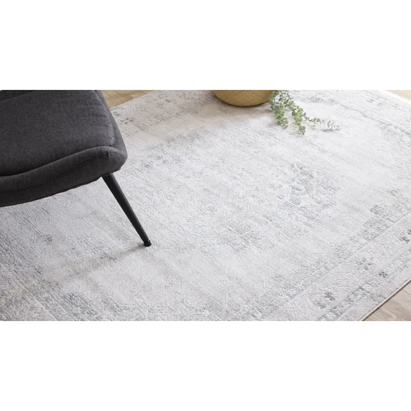 Modern DISTIN 0201A rug in white, blue, and light green with a vintage touch