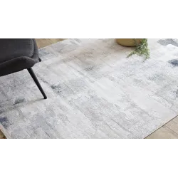 Stylish rug in shades of white, cream, and beige, perfect for modern interiors