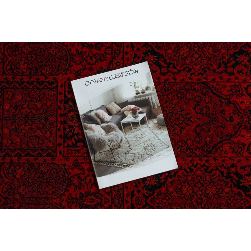 Burgundy and black rug in oriental style, perfect for living room decor