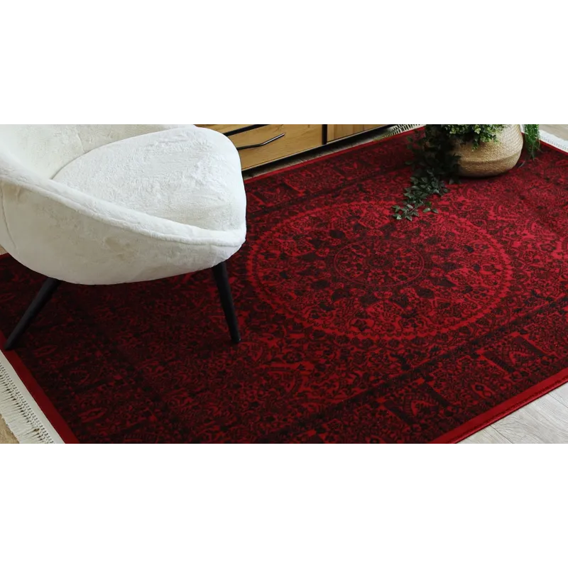 Burgundy and black rug with oriental design, classic carpet style