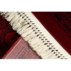 Classic bedroom rug in burgundy, oriental style