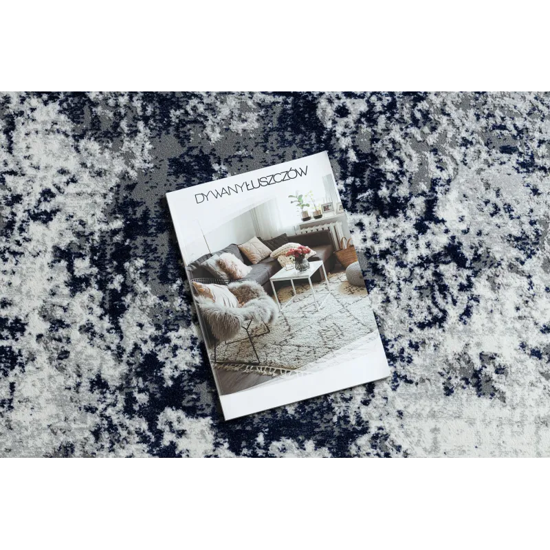Stylish white and blue rug with abstract design, modern carpet for contemporary decor