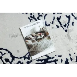 Modern rug with white and blue patterns, stylish and elegant