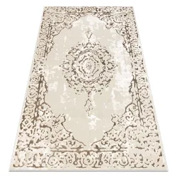 Glamorous cream and gold modern rug with a structured design
