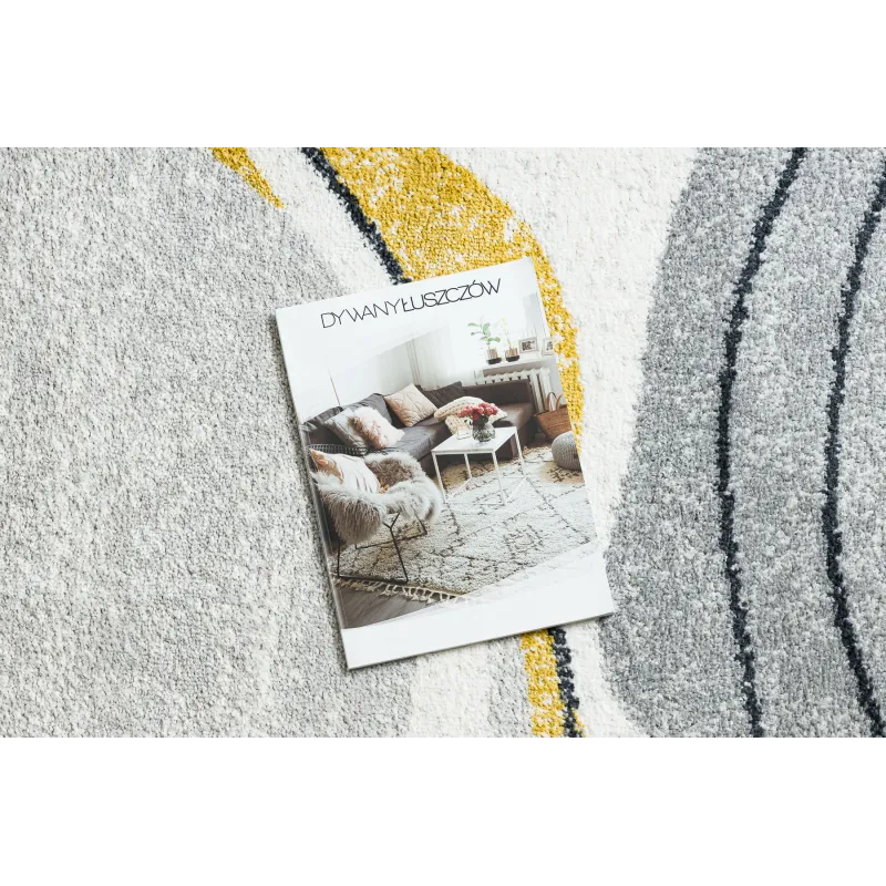 Stylish rug in white and yellow shades, perfect for modern interiors