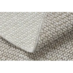 Beige rug suitable for gardens, relaxation areas, or kids' rooms
