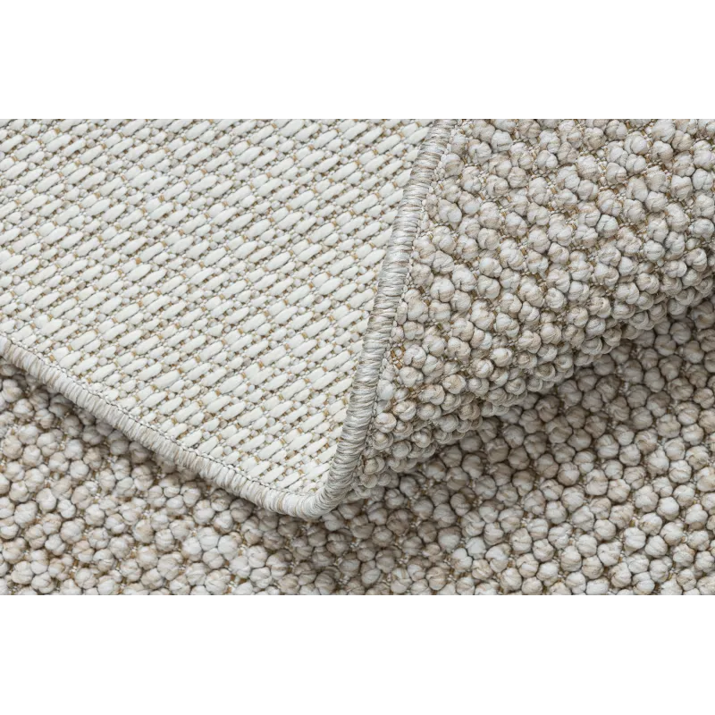 Beige rug suitable for gardens, relaxation areas, or kids' rooms