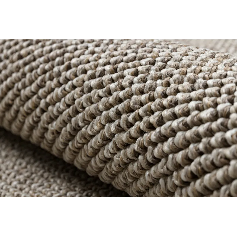 Perfect for outdoor spaces, this brown rug adds style and comfort to patios