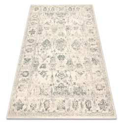 ABBY wool rug in classic beige and green with OSTA ornament