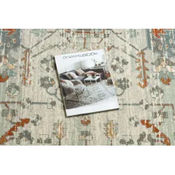 Stylish wool rug in beige and green shades, perfect for any interior
