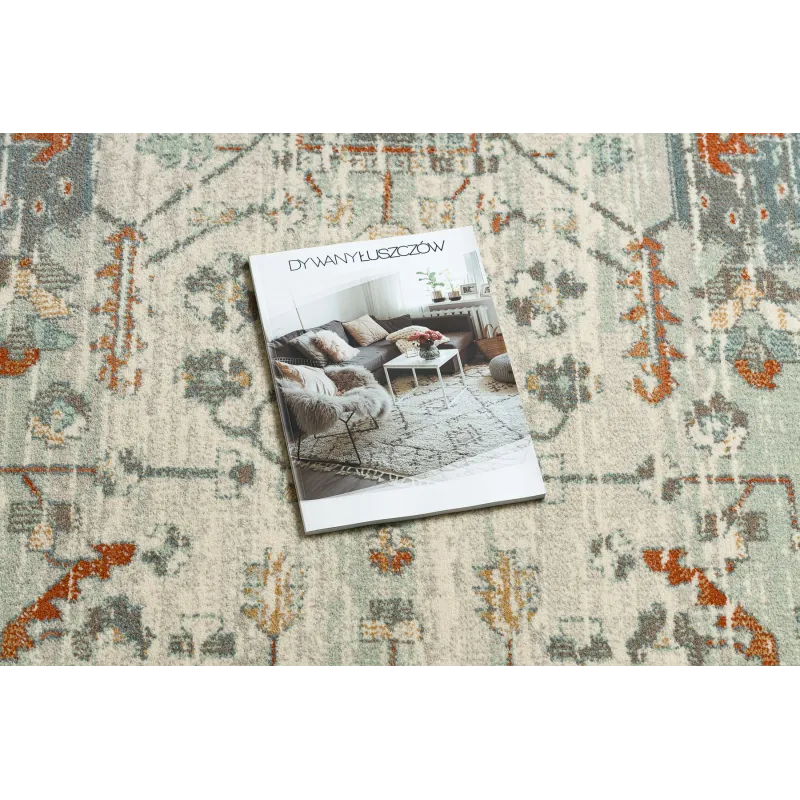 Stylish wool rug in beige and green shades, perfect for any interior