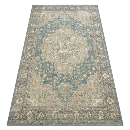 SOHO wool rug featuring a green and blue ornament design