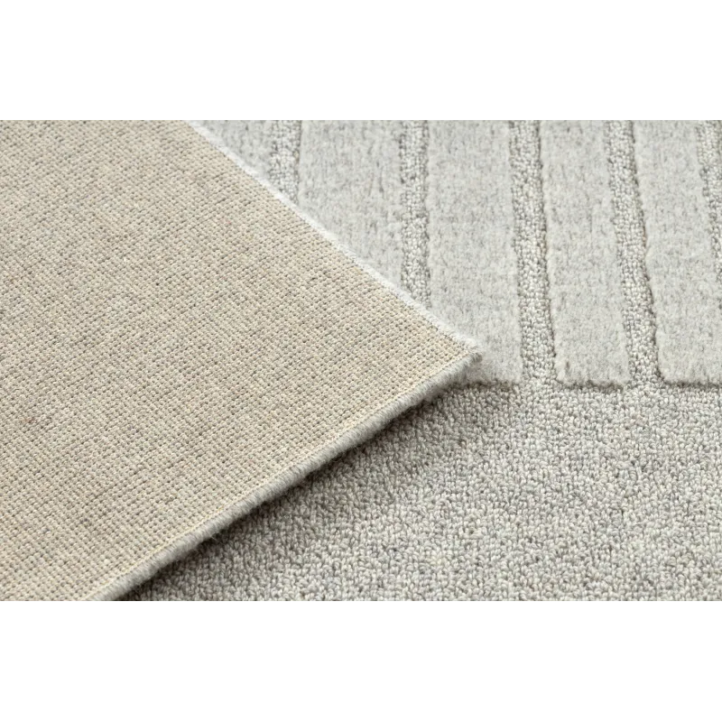 Soft wool rug with a textured pattern, great for the living room